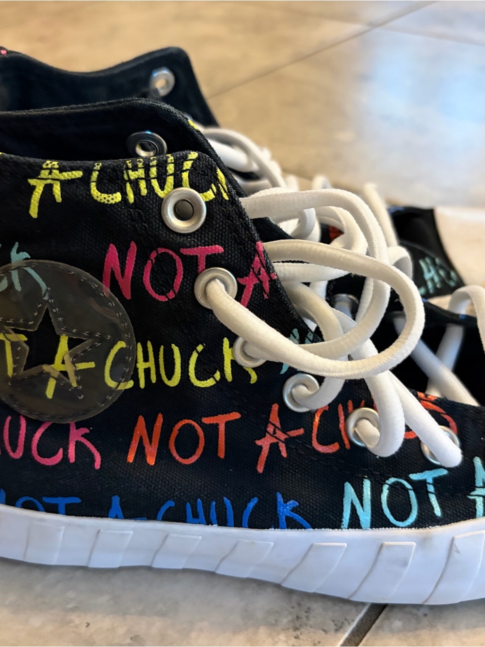 Kids Converse Black High-Top Sneakers with Multicolor 'Not a Chuck' Print